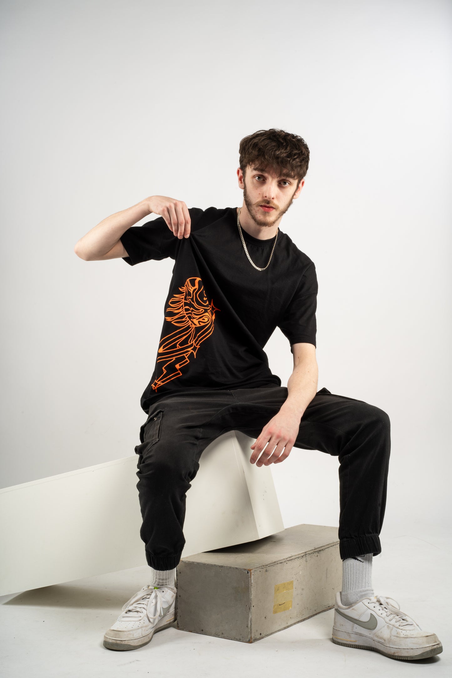 Black T-Shirt - Cosmic Orange Print