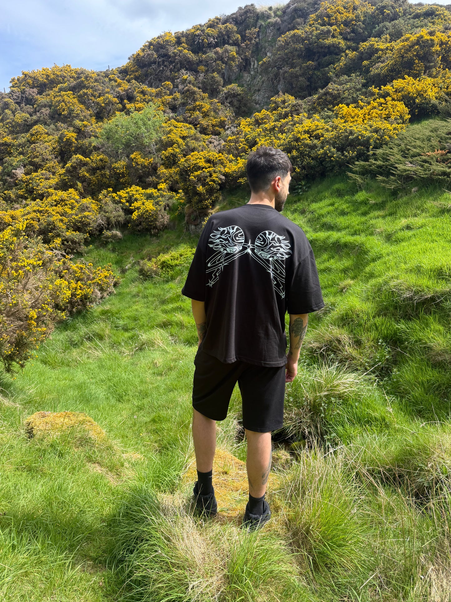 Oversized back print wings WUUSHii logo tartan mens black t shirt
