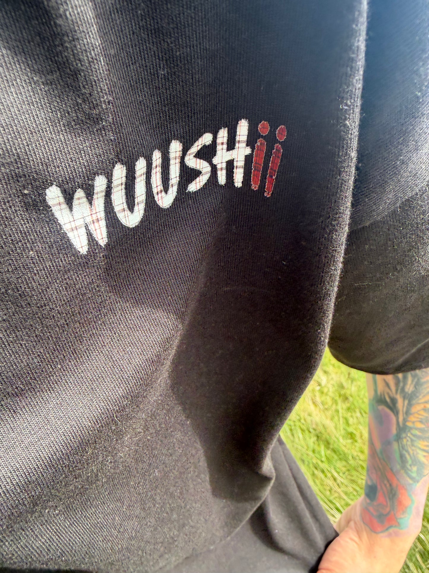 Oversized back print wings WUUSHii logo tartan mens black t shirt