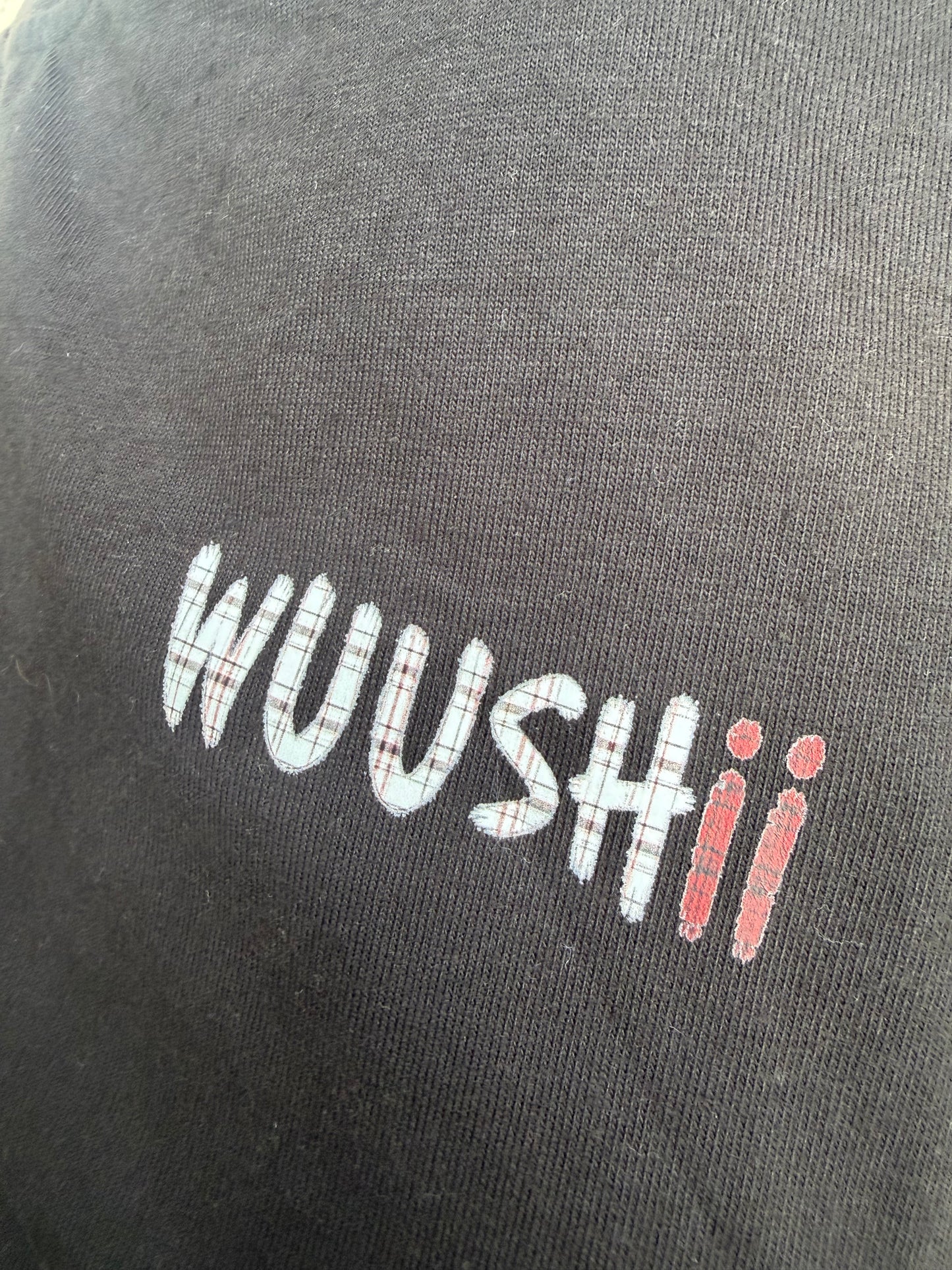 Oversized back print wings WUUSHii logo tartan mens black t shirt